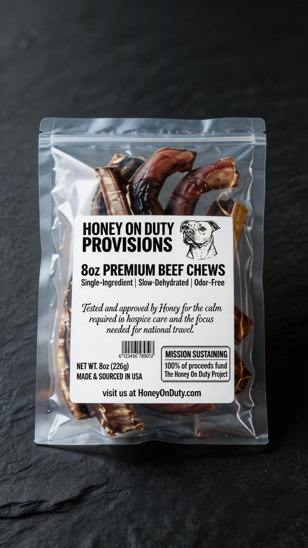 Close-up of Honey On Duty Provisions 8oz Premium Beef Chews packaging showing product label with single ingredient slow dehydrated odor-free details, mission sustaining dog treats
